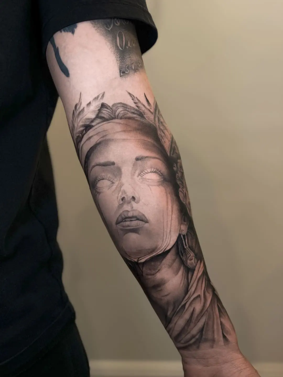 female portrait realistic tattoo style by oleg.r.tattoo calgary