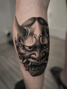 Hannya mask leg tattoo by oleg.r.tattoo Calgary