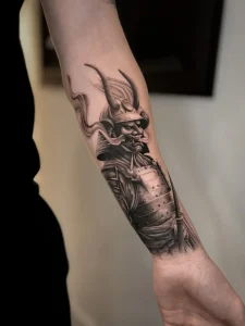 Japanese warrior with traditional mask dark realism tattoo by oleg.r.tattoo