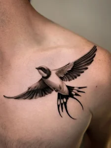 realistic swallow tattoo by oleg.r.tattoo in Calgary